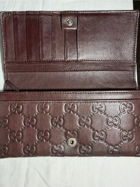 Gucci Dark Brown Embossed GG Continental Wallet